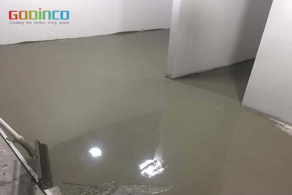  Láng sàn cần cán phẳng xi măng